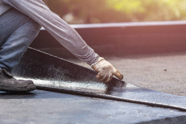 Professional Basement Waterproofing technician working in Riverdale, GA